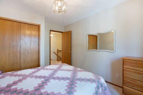 26 Sunhaven Link Se, Calgary, AB - Indoor Photo Showing Bedroom