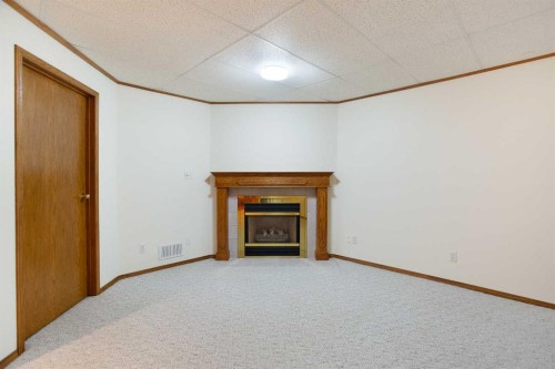 26 Sunhaven Link Se, Calgary, AB - Indoor With Fireplace