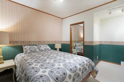 26 Sunhaven Link Se, Calgary, AB - Indoor Photo Showing Bedroom