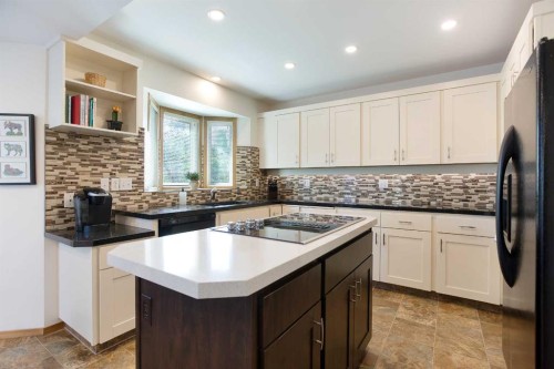 26 Sunhaven Link Se, Calgary, AB - Indoor Photo Showing Kitchen With Double Sink