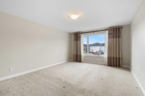 486 Silverado Boulevard Sw, Calgary, AB - Indoor Photo Showing Other Room