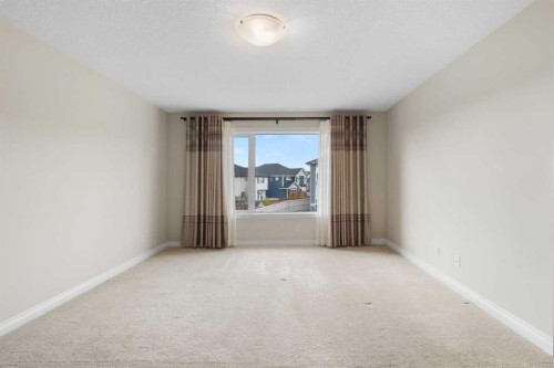 486 Silverado Boulevard Sw, Calgary, AB - Indoor Photo Showing Other Room