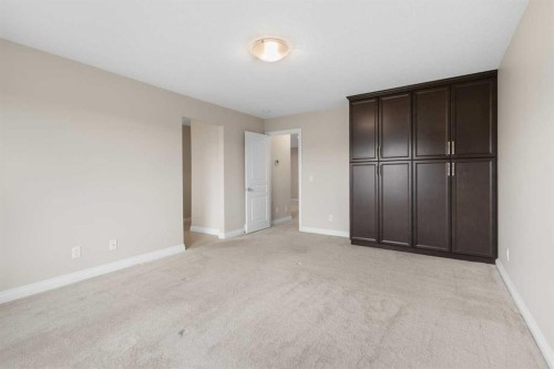 486 Silverado Boulevard Sw, Calgary, AB - Indoor Photo Showing Other Room