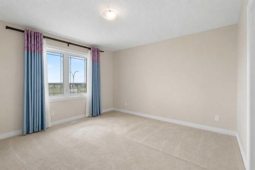 486 Silverado Boulevard Sw, Calgary, AB - Indoor Photo Showing Other Room