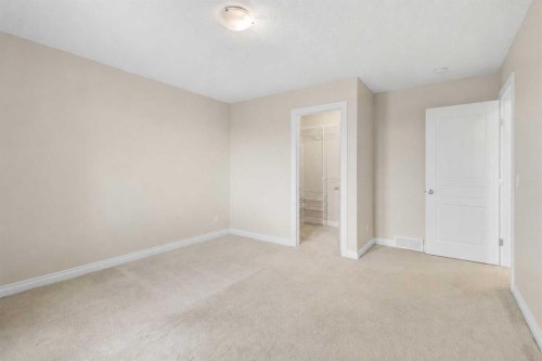 486 Silverado Boulevard Sw, Calgary, AB - Indoor Photo Showing Other Room