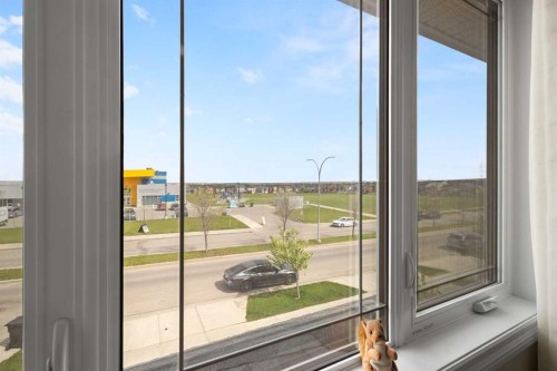 486 Silverado Boulevard Sw, Calgary, AB - Indoor Photo Showing Other Room