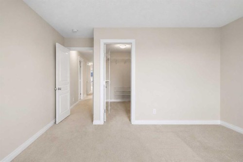 486 Silverado Boulevard Sw, Calgary, AB - Indoor Photo Showing Other Room