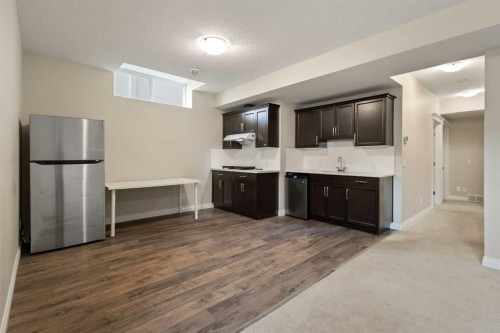 486 Silverado Boulevard Sw, Calgary, AB - Indoor Photo Showing Kitchen