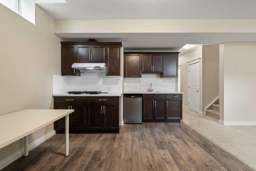 486 Silverado Boulevard Sw, Calgary, AB - Indoor Photo Showing Kitchen