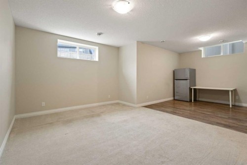 486 Silverado Boulevard Sw, Calgary, AB - Indoor Photo Showing Other Room