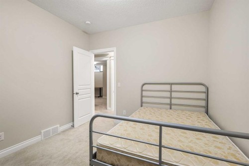 486 Silverado Boulevard Sw, Calgary, AB - Indoor Photo Showing Bedroom