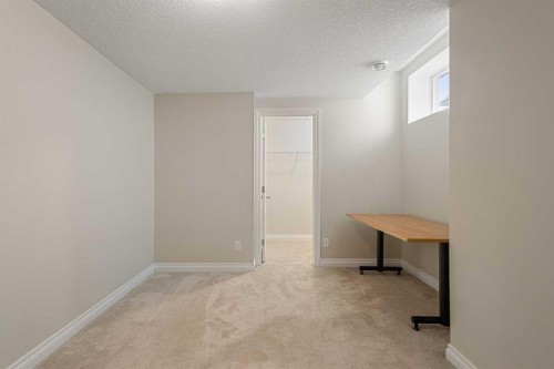 486 Silverado Boulevard Sw, Calgary, AB - Indoor Photo Showing Other Room