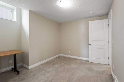 486 Silverado Boulevard Sw, Calgary, AB - Indoor Photo Showing Other Room