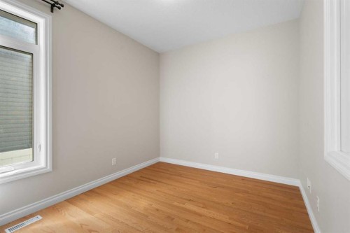 486 Silverado Boulevard Sw, Calgary, AB - Indoor Photo Showing Other Room