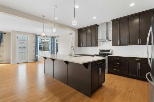 486 Silverado Boulevard Sw, Calgary, AB - Indoor Photo Showing Kitchen With Upgraded Kitchen