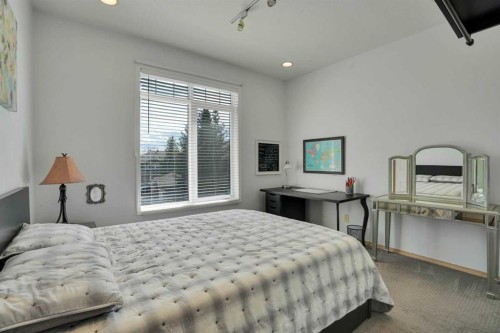 6 Discovery Woods Villas Sw, Calgary, AB - Indoor Photo Showing Bedroom