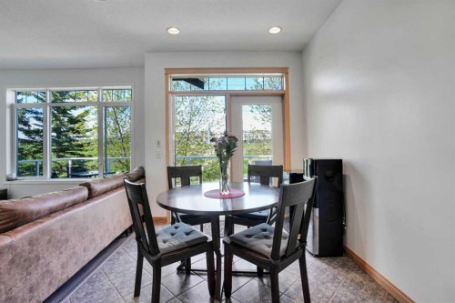 6 Discovery Woods Villas Sw, Calgary, AB - Indoor Photo Showing Dining Room