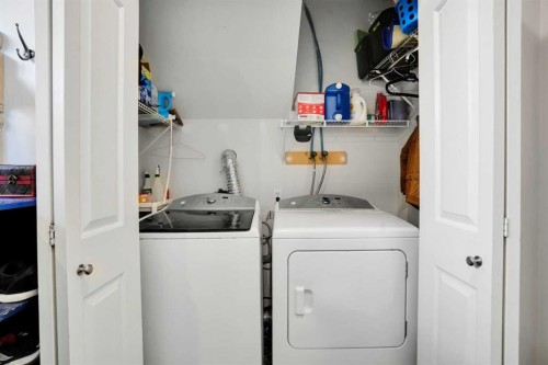 6 Discovery Woods Villas Sw, Calgary, AB - Indoor Photo Showing Laundry Room