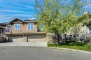 6 Discovery Woods Villas Sw, Calgary, AB  - Outdoor With Facade 