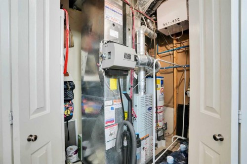 6 Discovery Woods Villas Sw, Calgary, AB - Indoor Photo Showing Basement
