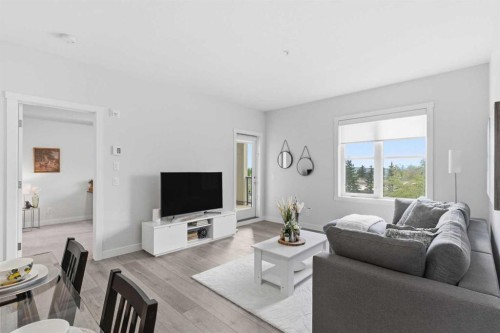 1306-81 Arbour Lake View Nw, Calgary, AB - Indoor Photo Showing Living Room
