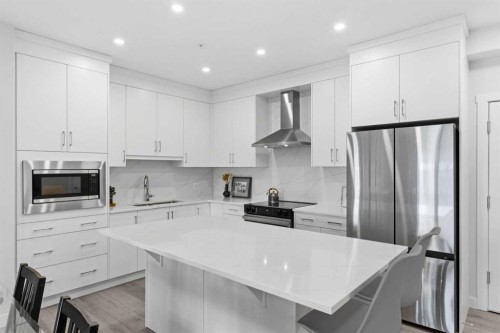 1306-81 Arbour Lake View Nw, Calgary, AB - Indoor Photo Showing Kitchen With Upgraded Kitchen