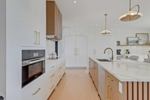 159 Rosery Drive Nw, Calgary, AB - Indoor Photo Showing Kitchen With Double Sink With Upgraded Kitchen