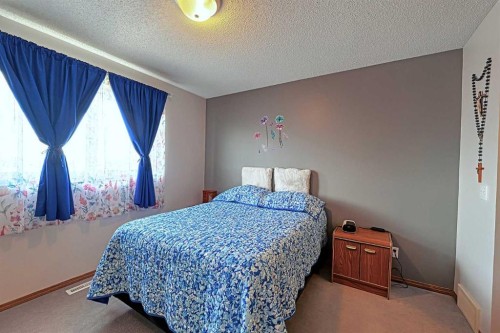 234 Martinvalley Mews Ne, Calgary, AB - Indoor Photo Showing Bedroom