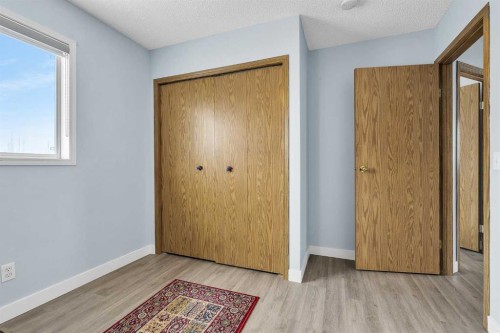 159 Hidden Way Nw, Calgary, AB - Indoor Photo Showing Other Room
