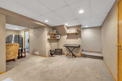 159 Hidden Way Nw, Calgary, AB - Indoor Photo Showing Basement