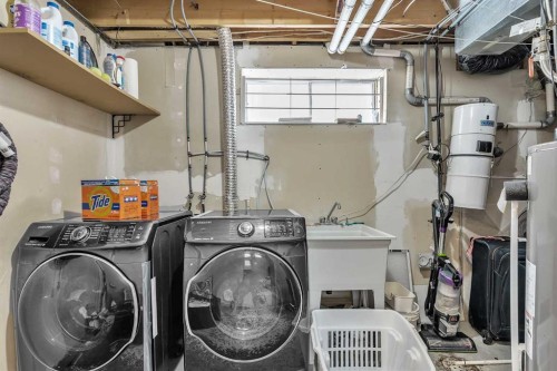 159 Hidden Way Nw, Calgary, AB - Indoor Photo Showing Laundry Room
