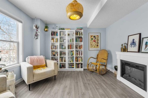 159 Hidden Way Nw, Calgary, AB - Indoor With Fireplace