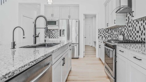 34 Lucas Terrace Nw, Calgary, AB - Indoor Photo Showing Kitchen With Double Sink With Upgraded Kitchen