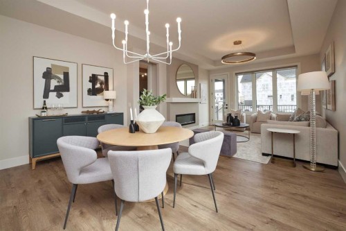  - Indoor Photo Showing Dining Room With Fireplace