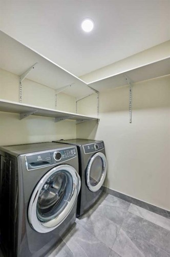 252 Edgebank Circle Nw, Calgary, AB - Indoor Photo Showing Laundry Room