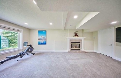 252 Edgebank Circle Nw, Calgary, AB - Indoor With Fireplace