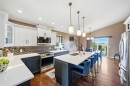 164 Hillcrest Boulevard, Strathmore, AB  - Indoor Photo Showing Kitchen With Double Sink With Upgraded Kitchen 