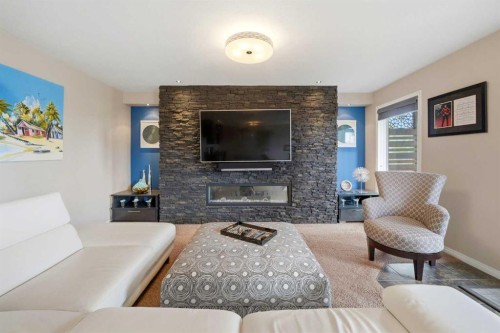 164 Hillcrest Boulevard, Strathmore, AB - Indoor Photo Showing Living Room With Fireplace