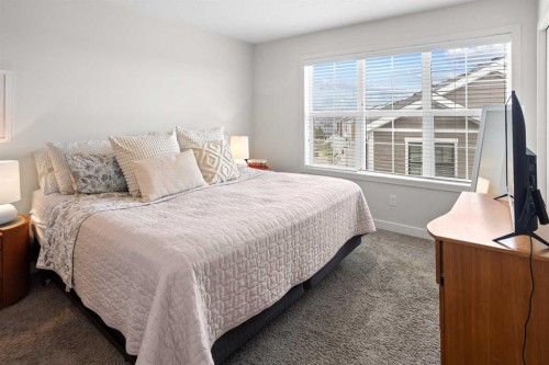 8 Sherwood Row Nw, Calgary, AB - Indoor Photo Showing Bedroom