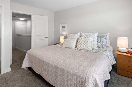 8 Sherwood Row Nw, Calgary, AB - Indoor Photo Showing Bedroom