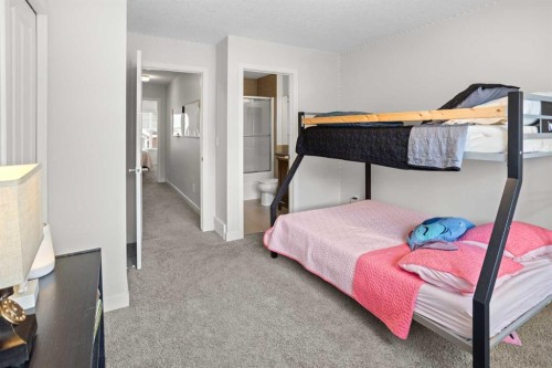 8 Sherwood Row Nw, Calgary, AB - Indoor Photo Showing Bedroom