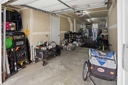 8 Sherwood Row Nw, Calgary, AB - Indoor Photo Showing Garage