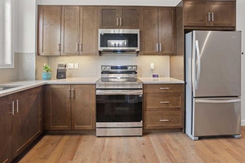 8 Sherwood Row Nw, Calgary, AB - Indoor Photo Showing Kitchen With Stainless Steel Kitchen With Upgraded Kitchen