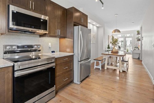 8 Sherwood Row Nw, Calgary, AB - Indoor Photo Showing Kitchen With Stainless Steel Kitchen With Upgraded Kitchen