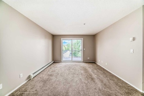1220-10 Prestwick Bay Se, Calgary, AB - Indoor Photo Showing Other Room
