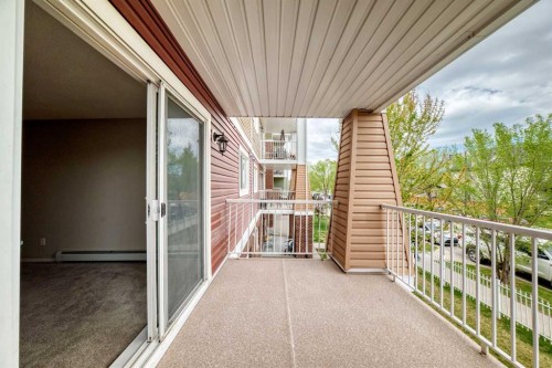1220-10 Prestwick Bay Se, Calgary, AB - Outdoor With Balcony With Exterior