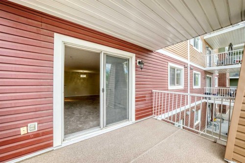 1220-10 Prestwick Bay Se, Calgary, AB - Outdoor With Balcony With Exterior