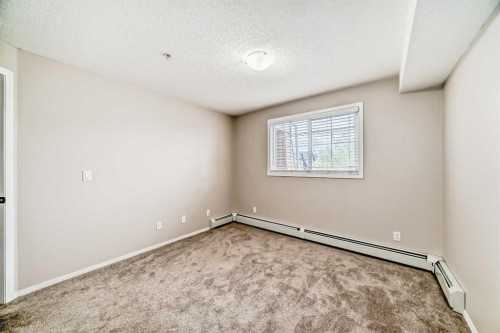 1220-10 Prestwick Bay Se, Calgary, AB - Indoor Photo Showing Other Room