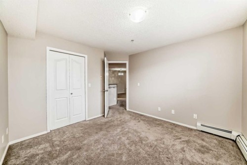 1220-10 Prestwick Bay Se, Calgary, AB - Indoor Photo Showing Other Room