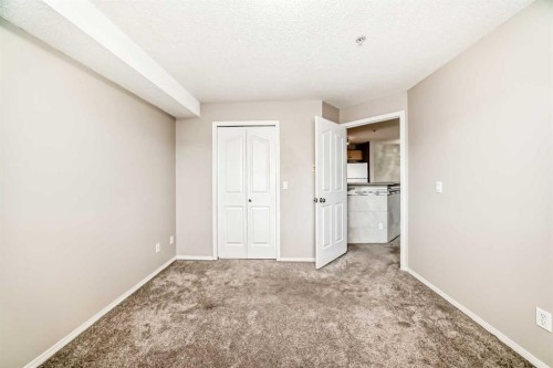 1220-10 Prestwick Bay Se, Calgary, AB - Indoor Photo Showing Other Room